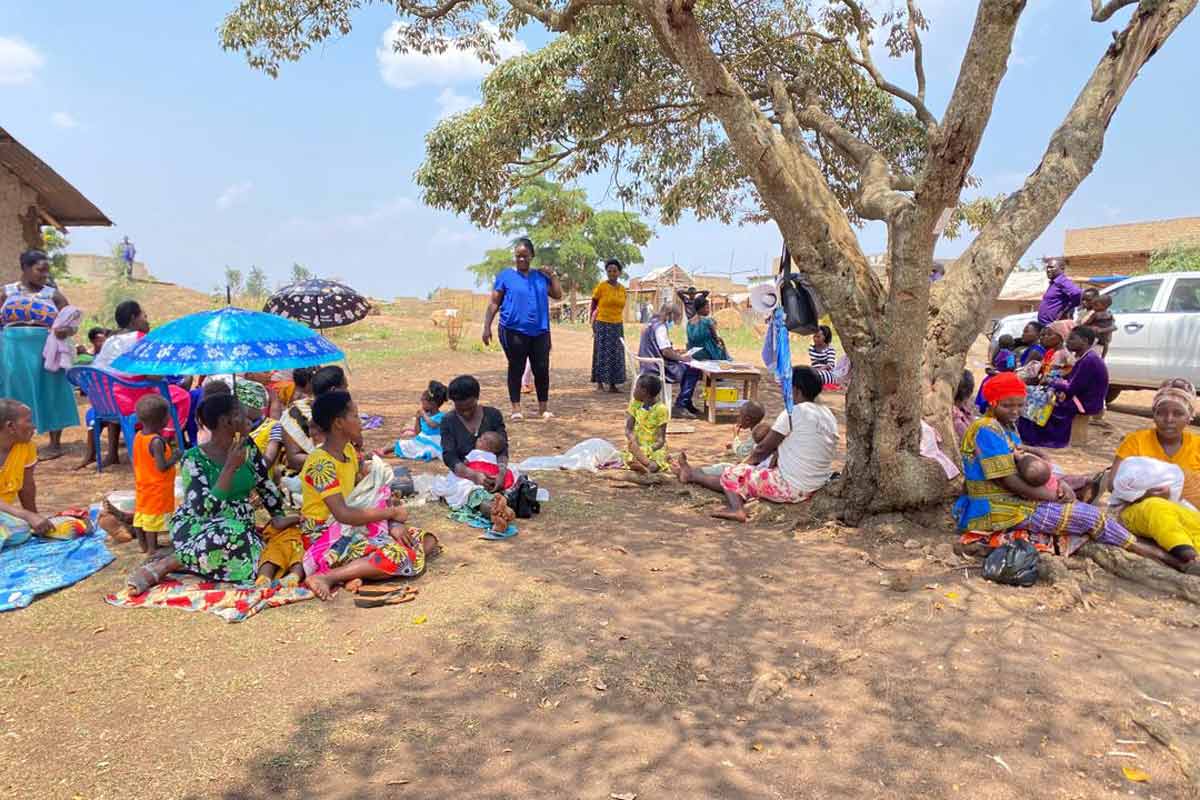 Namusoke (in blue) during a vaccination outreach in Kyegegwa district. Credit: Daphne Namusoke