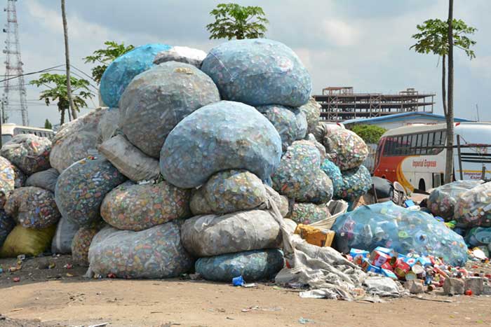 As researchers, policymakers and the public seek plastic pollution solutions, the petrochemical industry continues churning out new plastics in astronomical amounts. Image by Ryan Brooklyn via Unsplash