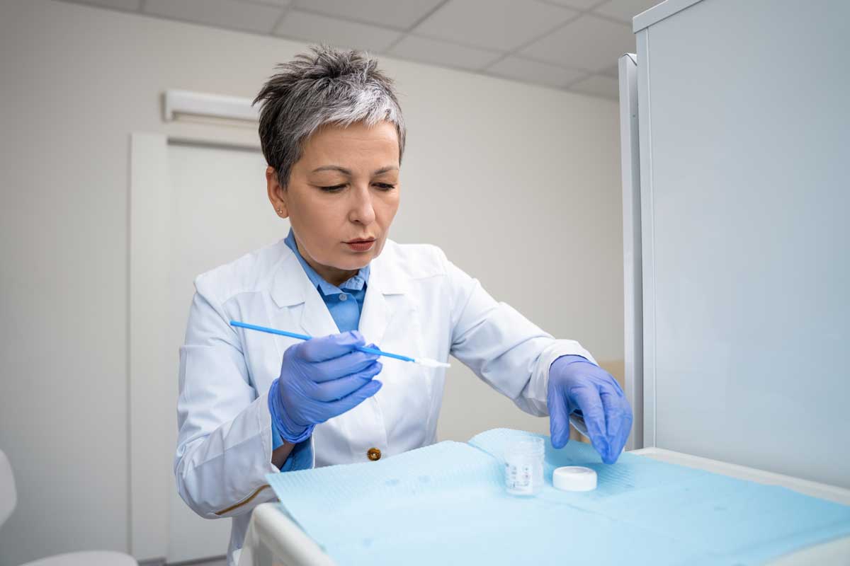 A patient sample is processed as part of a diagnostic examination in a clinic. Credit: Von Yakobchuk Olena