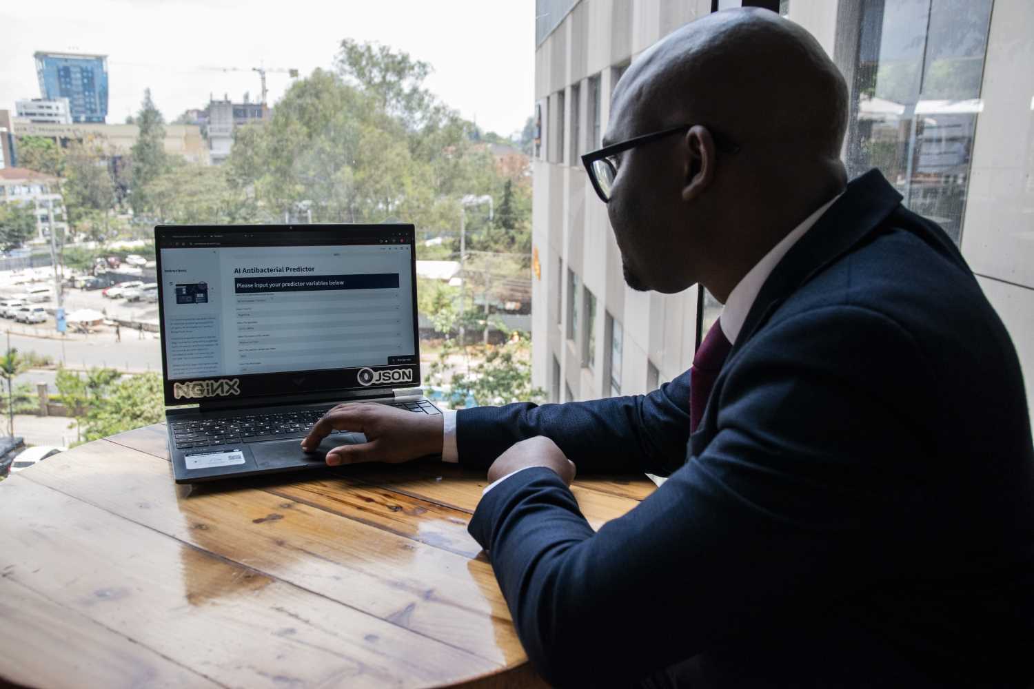 Dr Fredrick Mutisya using the Antimicro.ai platform in Nairobi, Kenya, to predict bacterial resistance to antibiotics in real time, thanks to Artificial Intelligence. Credit: Claudia Lacave/Hans Lucas
