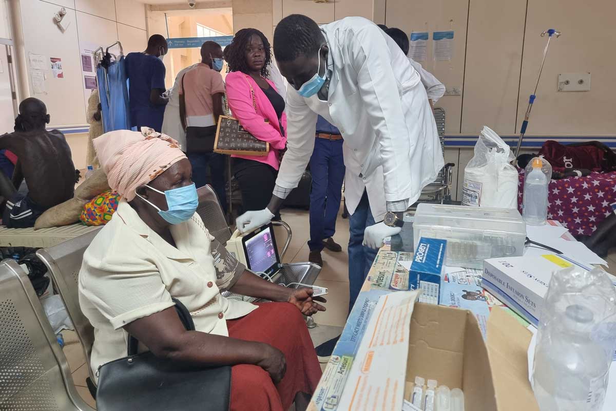 A patient has her blood pressure checked by a doctor at at Juba Teaching Hospital in South Sudan. Credit: Winnie Cirino