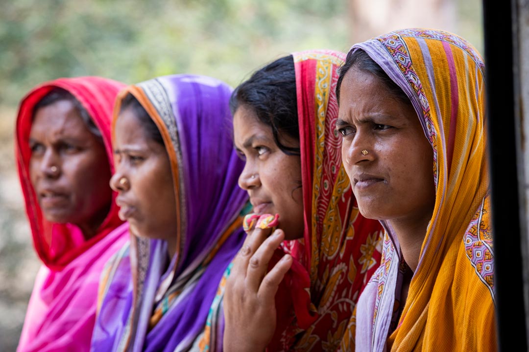 A group of women wait out side a Doctores clinic to recieve the Covishiled Vaccination, in the Sunderbarn / India. Credit: Gavi/2022/Benedikt v.Loebell