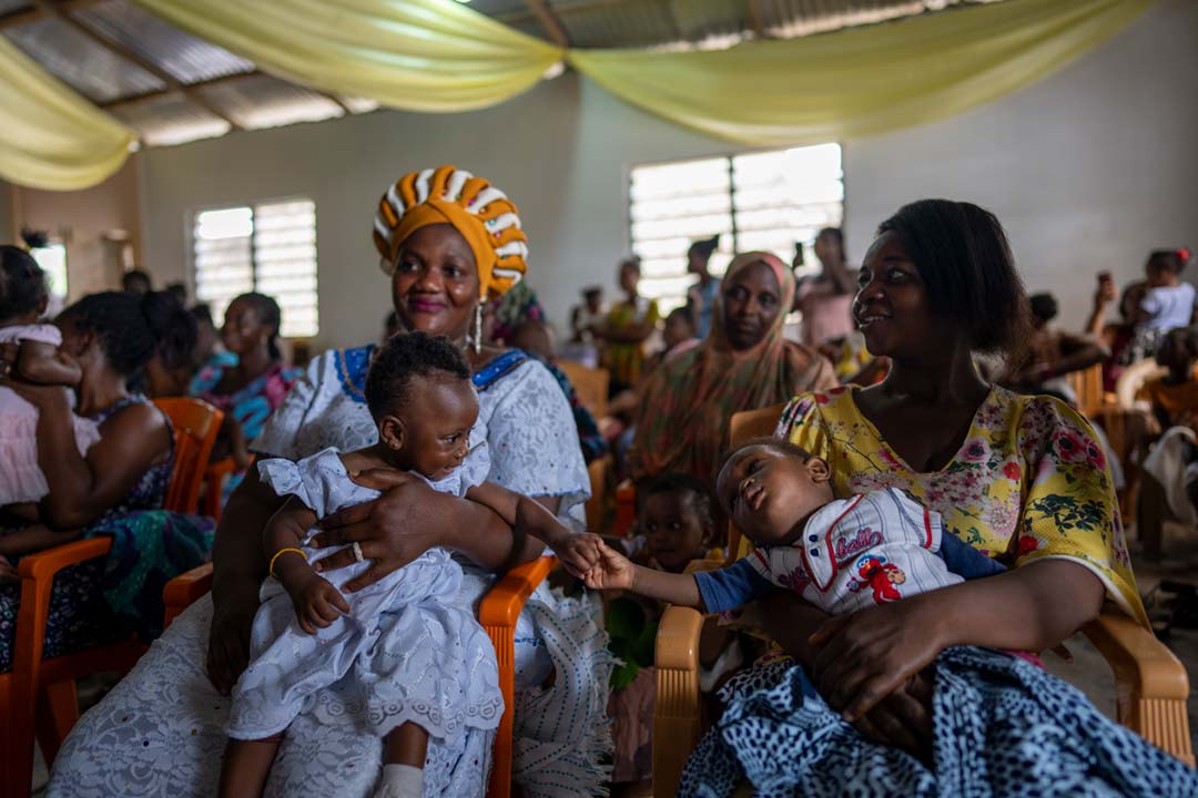 Mothers and children at a vaccination spot in Buduburam in the Gomoa East District of Ghana. Credit: The Global Fund/Nana Kofi Acquah