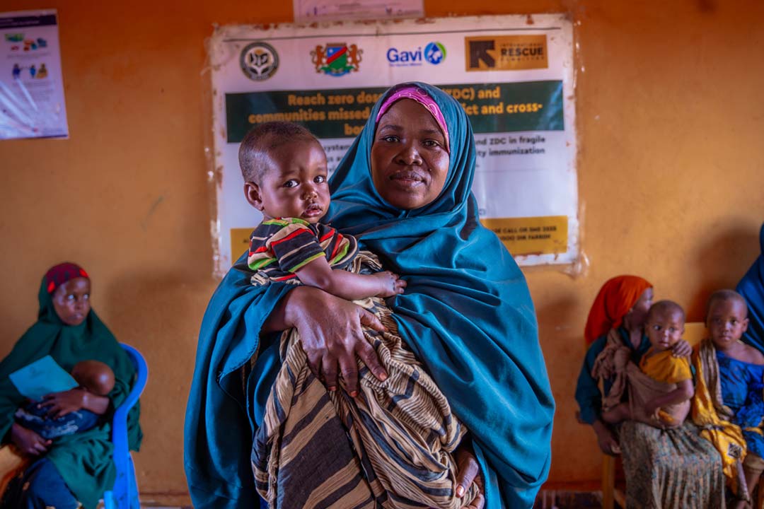 Amino Sidow holding her child after vaccination during the Reach Zero Dose Children (ZDC) campaign in Somalia, 2024. Credit: Gavi/2024/Mohamed Abdihakim Ali