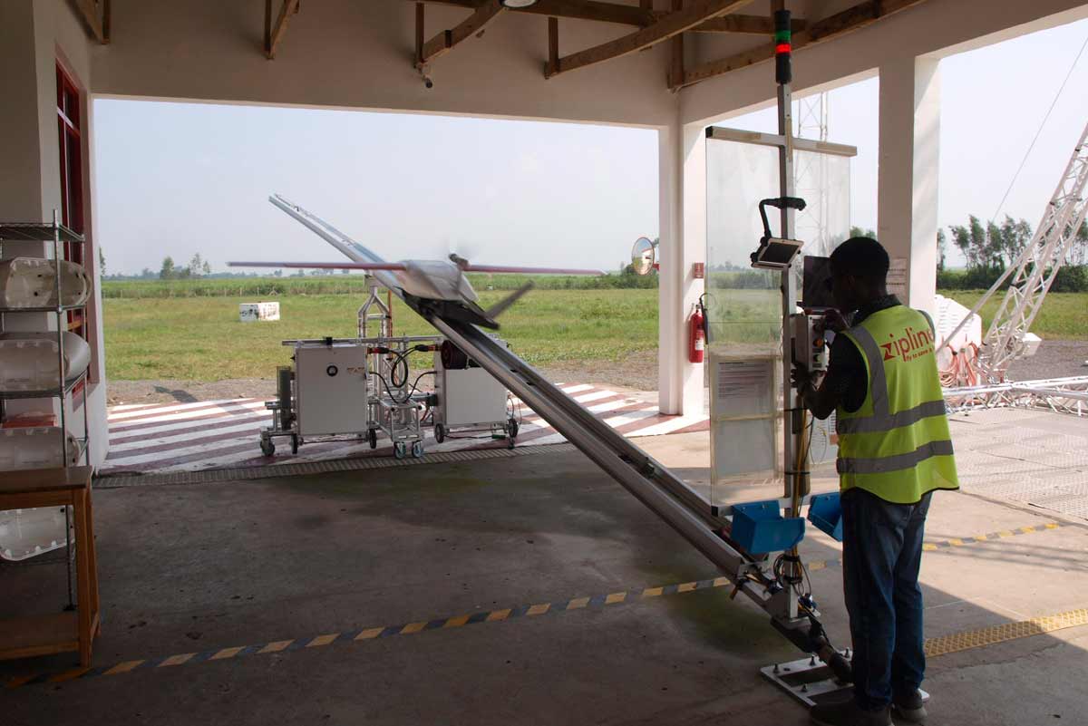 A staff member launches a drone at the Zipline KE-1 facility. Credit: Joseph Maina