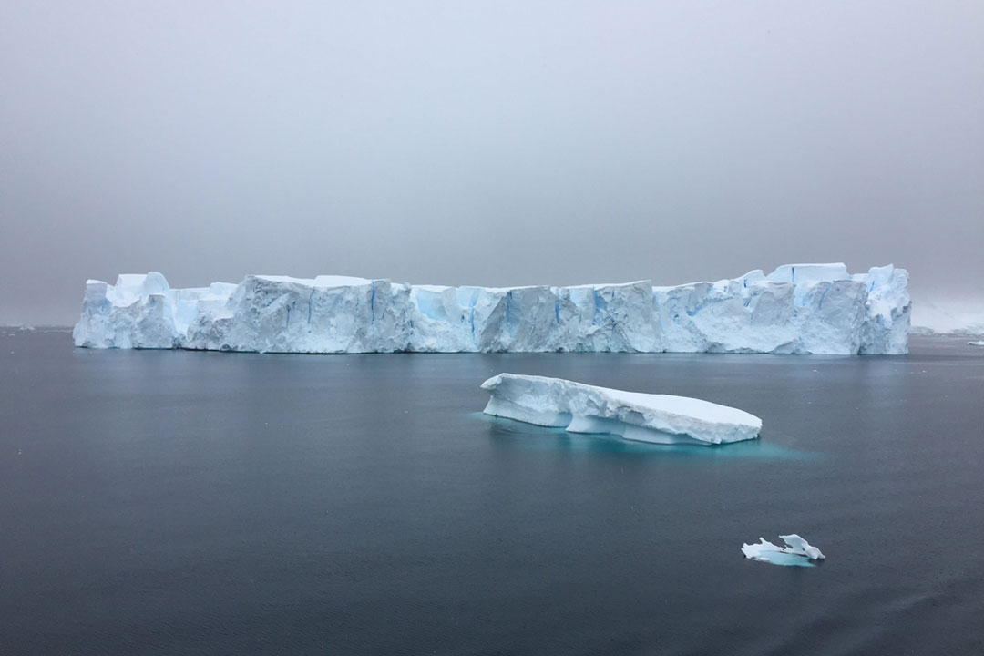 An iceberg in the ocean. Credit: DSD on Pexels