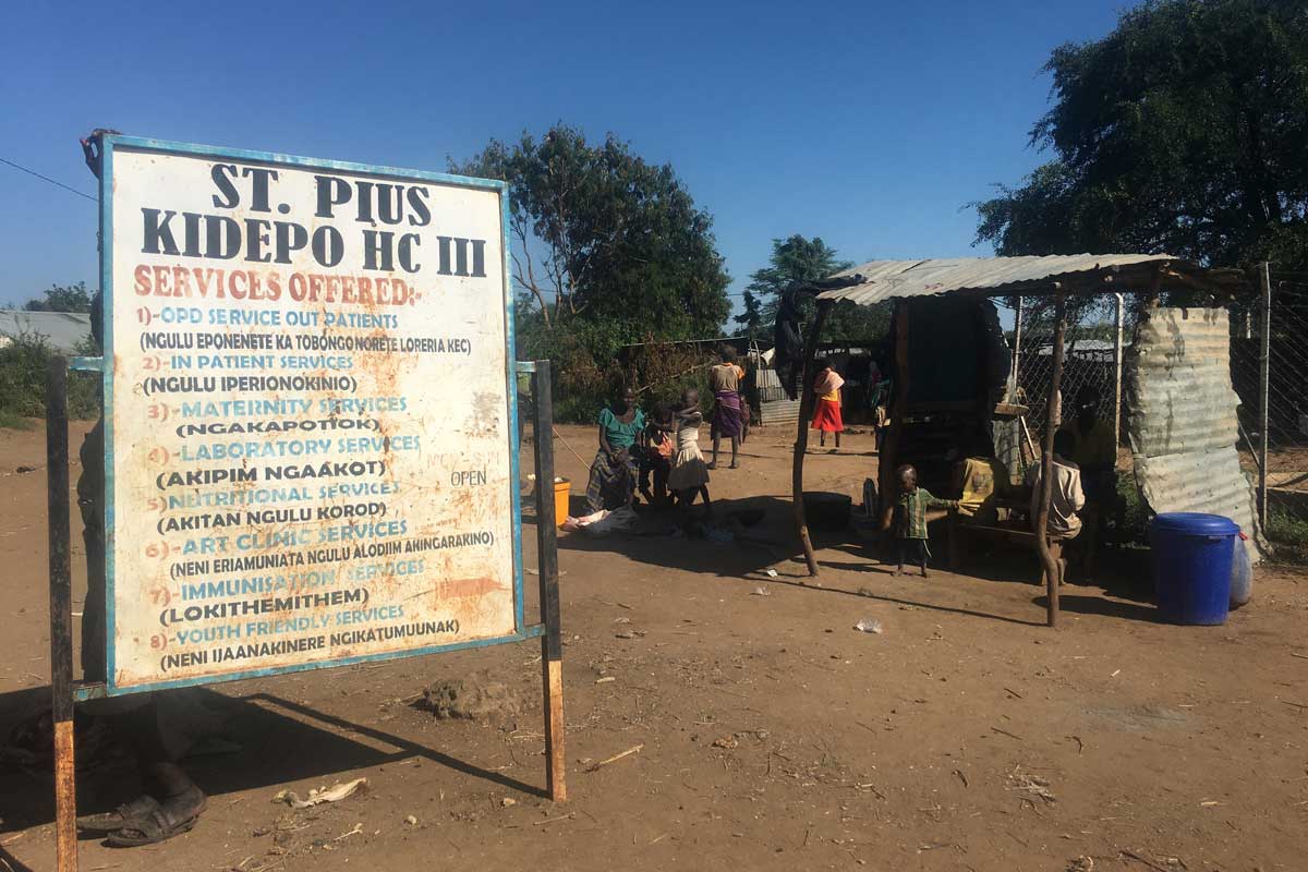 The signpost to St Pius Kidepo Health Centre III in Moroto. The facility is the only health centre closest to the kraals deep in Karamoja. Credit: John Agaba