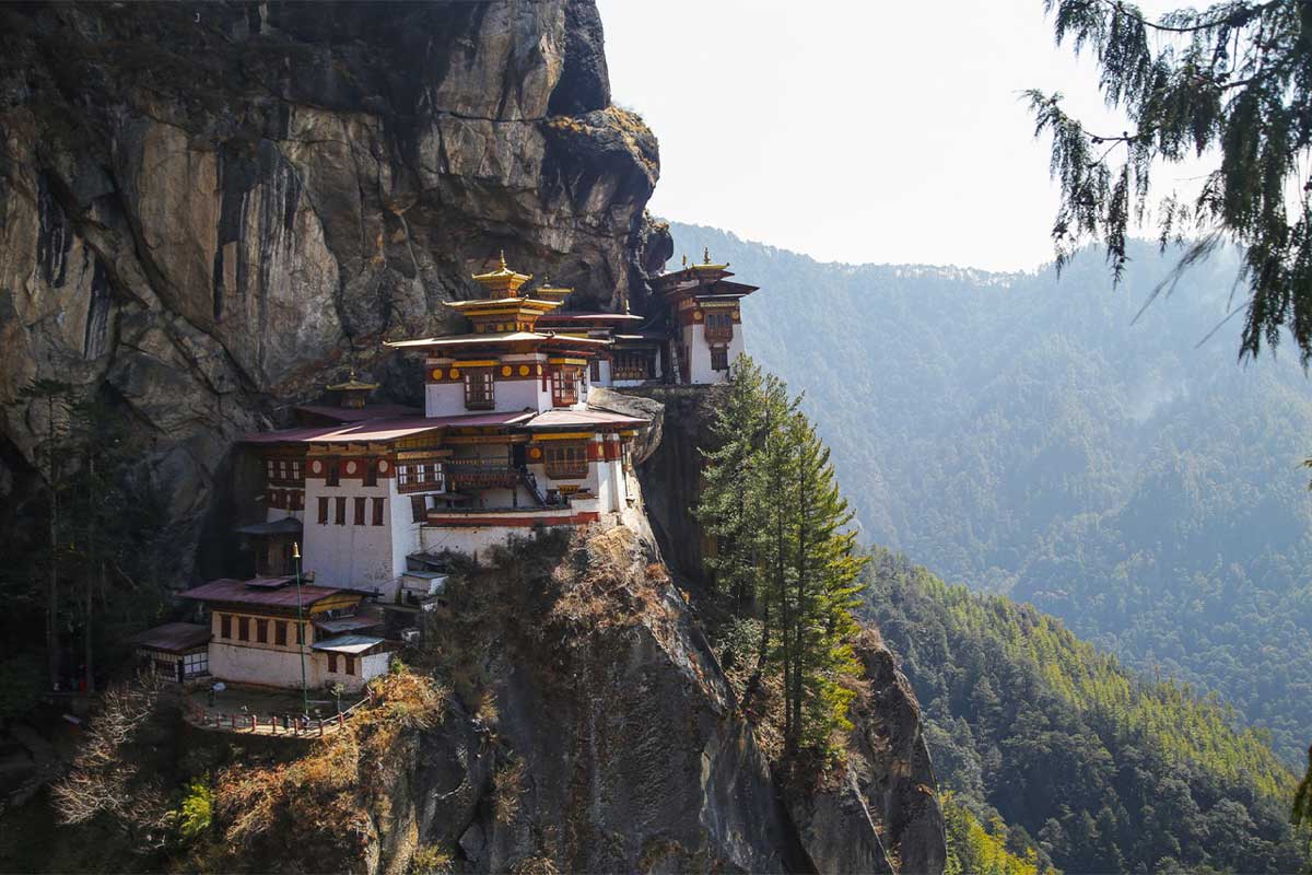 The Paro Taktsang is a sacred Himalayan Buddhist site located precariously on a cliff of the Upper Paro Valley in Bhutan. Climate change, with its extreme precipitation events, is now causing landslides in mountainous regions the world over. If a religious site like this one were washed away, the loss could add to community mental anguish. Image by Petro Kotze.