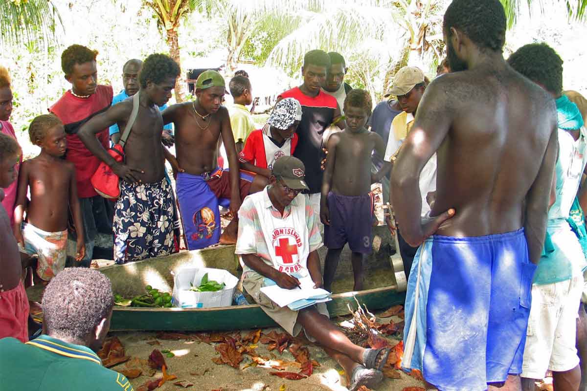Red Cross volunteer Jay Hong conducts assessments at Paramata village on Vella Lavella Island in the Solomon Islands after the April 2007 tsunami (not a climate change event). Although research has examined the mental health impact of disasters, including extreme weather events, fewer studies have investigated the psychosocial needs of individuals affected by slow-onset climate change. Image courtesy of IFRC/Rosemarie North.