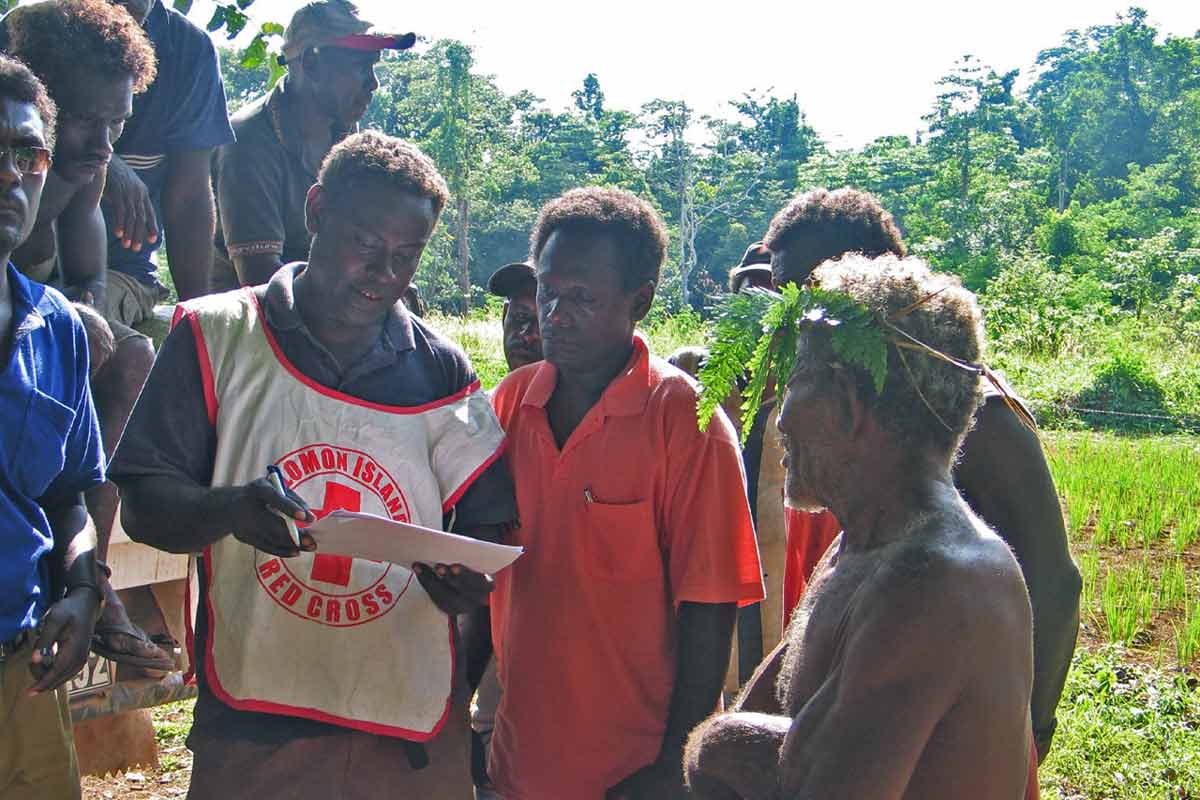 Climate change is impacting the Solomon Islands, leaving young people there feeling angry and frustrated at the lack of action to address their plight. Here, Solomon Islands Red Cross staff and volunteers assess people’s needs at Mile Six Camp, near Gizo town on Ghizo Island after the April 2007 tsunami. While aid and donations generally flood in after major disasters, long-term mental health services can be lacking for the day-to-day challenges posed by deepening climate change. Image courtesy of IFRC/Rosemarie North.