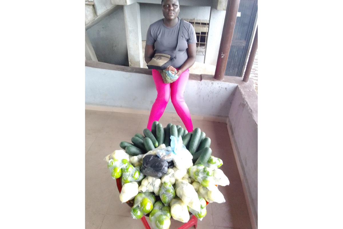Agnes Oluwakemi hawks cucumber, oranges, and other types of fruits. On learning about the bilharzia treatments, she made sure her child took part in it. Credit: Adetokunbo Abiola
