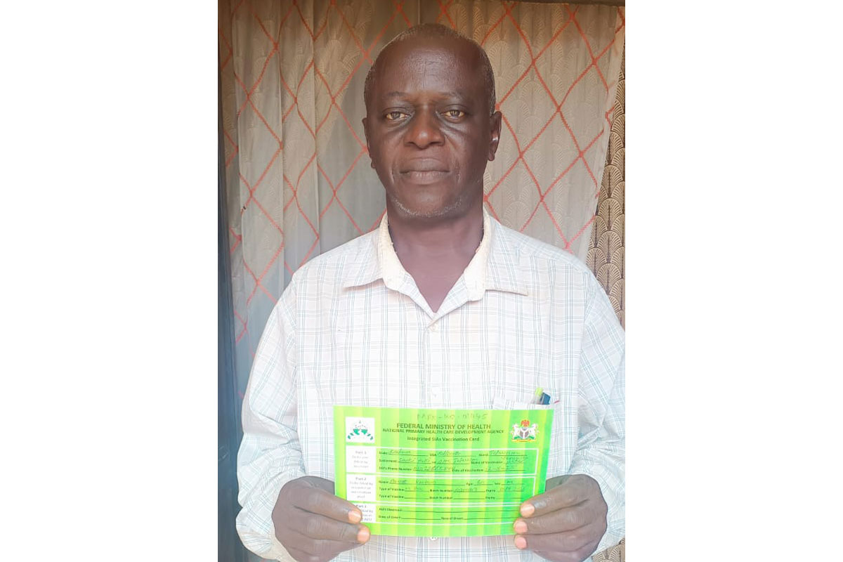 Amos Kintaro has been encouraging others to take the vaccine. Credit: Alex Uagbanoje