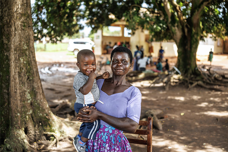 Akello Judith brought her child to Ibuje Health Centre 3 for malaria vaccination.