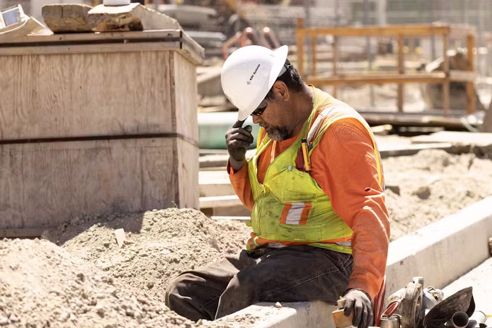 Construction workers are often out in the heat for long periods of time, including during this heat wave in Los Angeles in July 2024.  Etienne Laurent/AFP via Getty Images