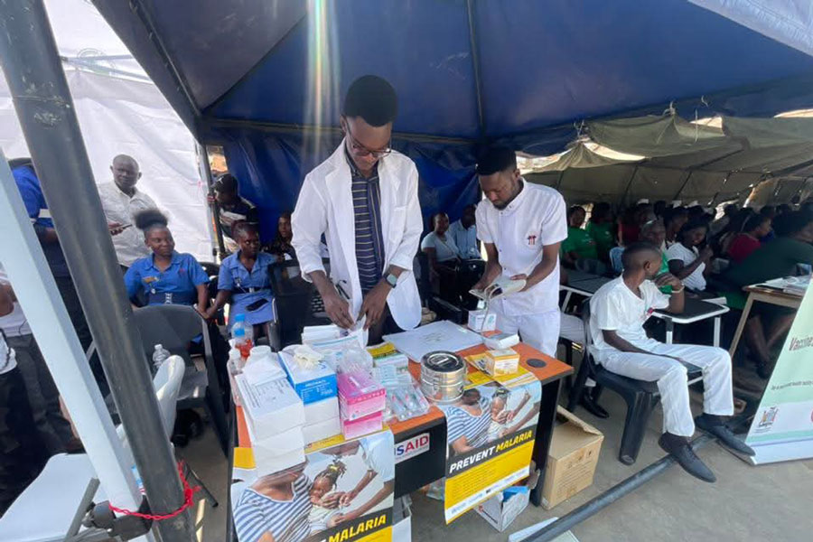 Health workers set up a vaccination center during the launch of the malaria vaccine in Mansa District. Credit: Ministry of Health