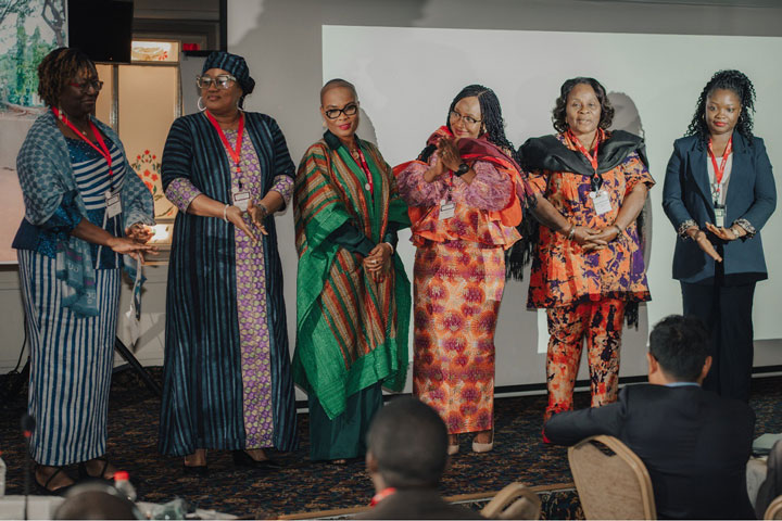 The Parliamentary delegation from Liberia (Sen. Dabah Varpilah, Hon. Rugie Yatu Barry, Hon. Prescilla Abram Cooper, Hon. Julie Fatorma Wiah, and Hon. Marie Grayon Johnson) are accompanied by Joyce Kilikpo, the Executive Director of GHAI’s CSO partner, Public Health Initiative Liberia.