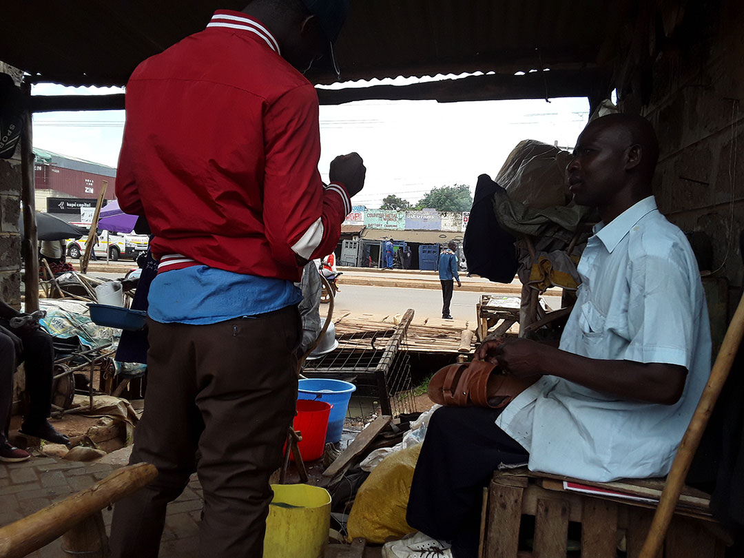 Kennedy Wanjala was completely paralysed on the right leg. He repairs shoes in Bungoma town. Credit: Joyce Chimbi