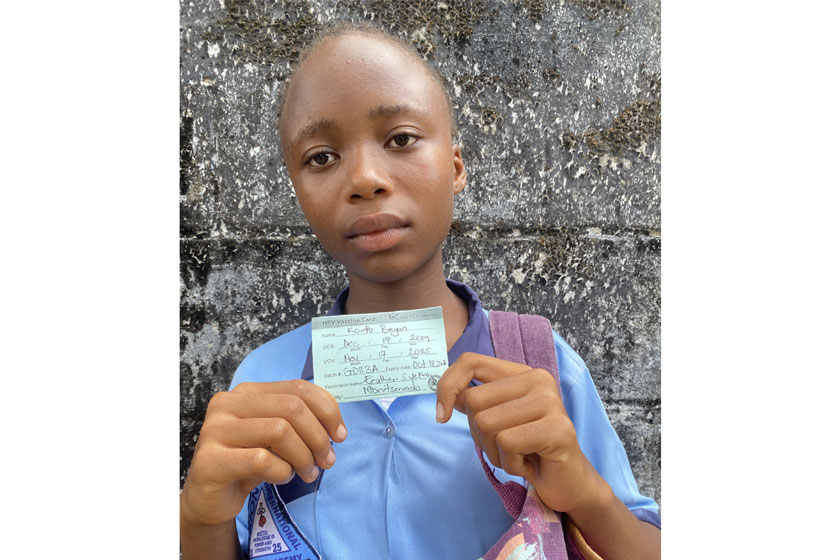 Korpo Beyan post with her card afteer receiving the HPVvaccine