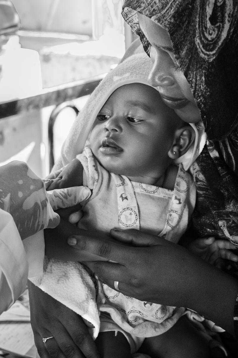 A child getting vaccinated at Umm Al Khair Local Hospital. Umm Al-Khair, Sudan. March 4, 2025.