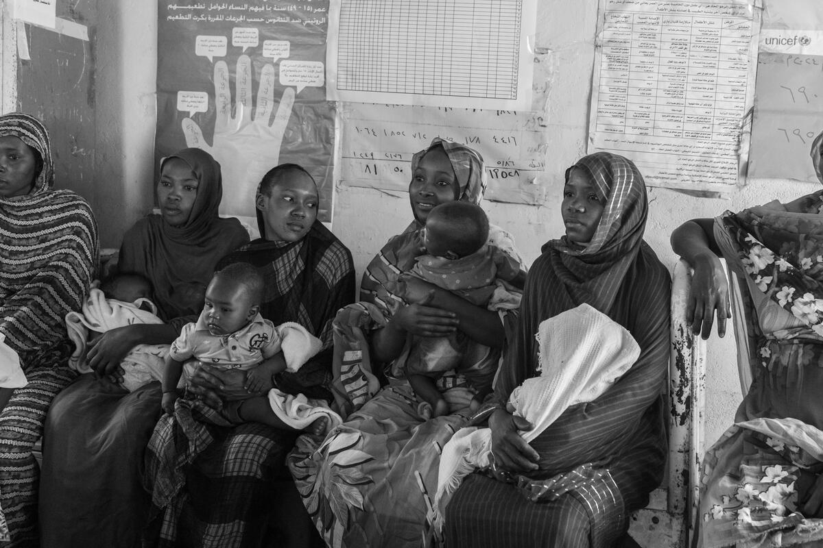 Mothers waiting for their turn to vaccinate their children at Umm Al Khair Local Hospital. Umm Al-Khair, Sudan. March 5, 2025.