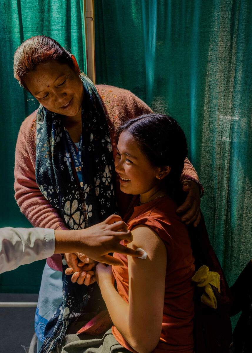 Diya, 12, receives the HPV vaccine at school. Timang, Nepal. March 3, 2025.