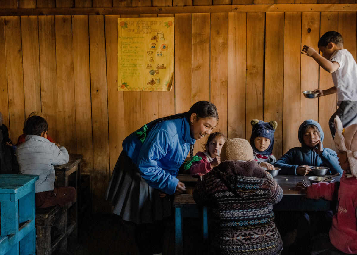 Ashika, 14, takes care of the younger children at school. Timang, Nepal. March 3, 2025.