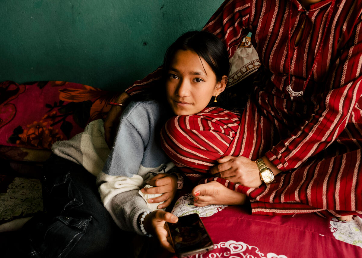 Aniva, 18, with her mother at home in Kathmandu. Aniva's aunt died from HPV cancer when she was younger. Aniva received the HPV vaccine as part of the vaccination campaign launched by Nepal and supported by Gavi, the Vaccine Alliance. Kathmandu, Nepal. March 8, 2025.
