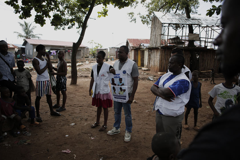 MSF Health Promotion and Community Engagement team members in the Calaba Town community in Freetown. Credit: Saidu Bah