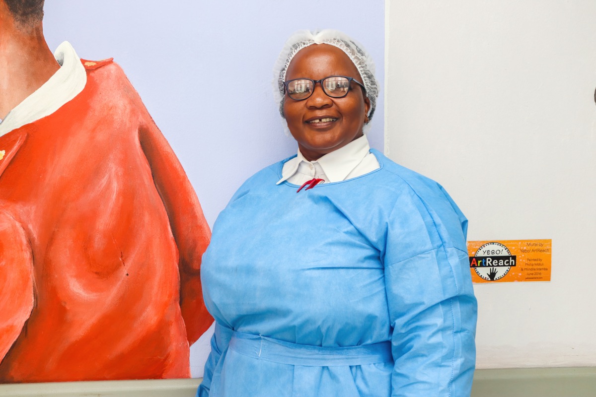 Midwife Lindiwe Shongwe in her hospital scrubs
