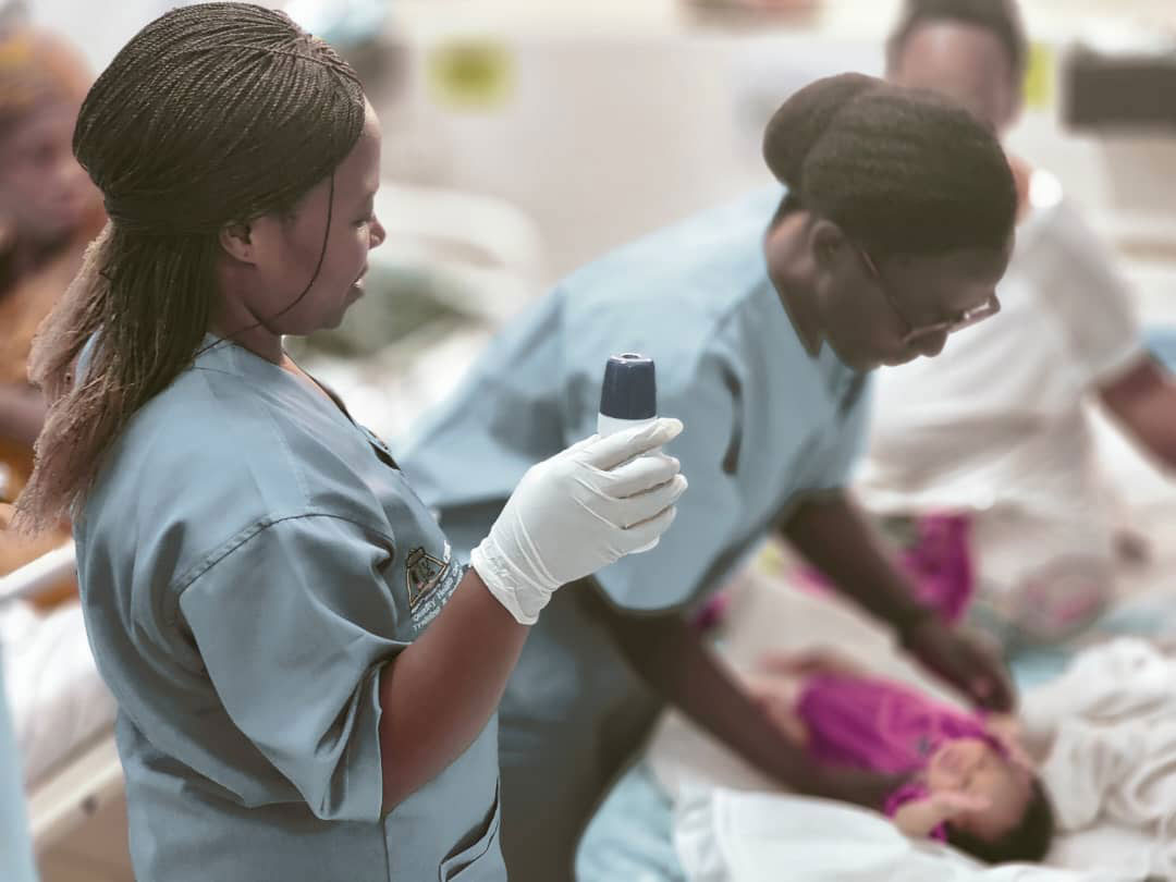 Neonatal medics at the University Teaching Hospital of Kigali (CHUK) attending to an infant. Credit: CHUK
