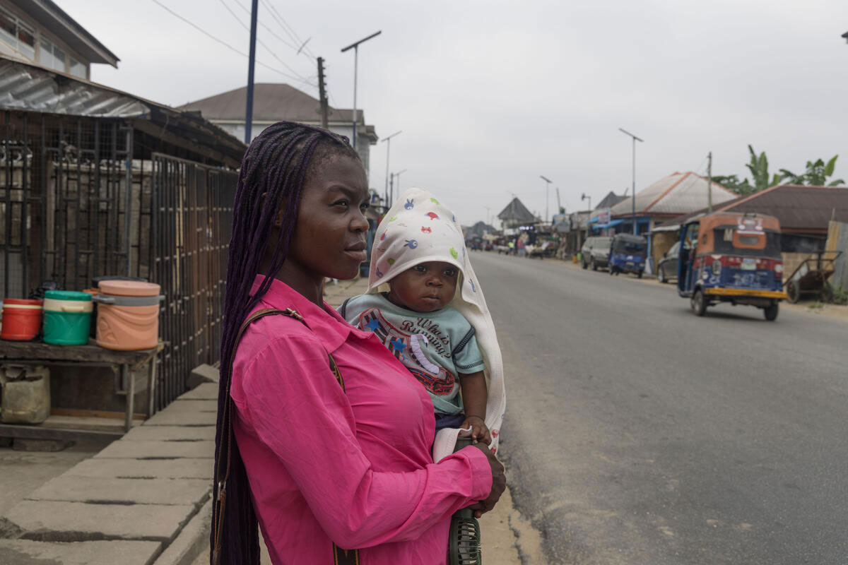 Permanent, 23, takes her 5-month-old baby, Talent, to the local hospital for a medical check-up in Onuegbu community, Bayelsa State. Ogbia. December 18, 2024. Credit: Jérôme Sessini
