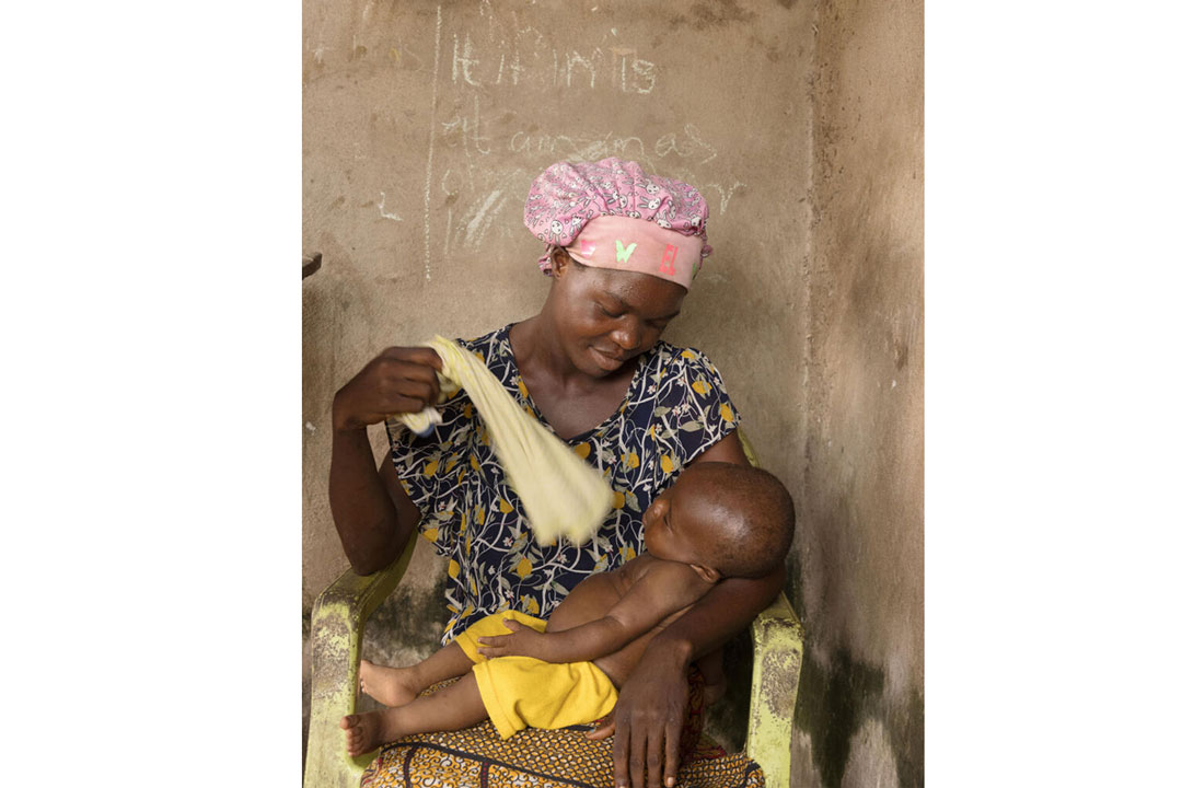 Permanent, 23, and her son Talent, who was vaccinated against malaria when he was 6 months old. Ogbiam Nigeria. December 17, 2024. Credit: Jérôme Sessini
