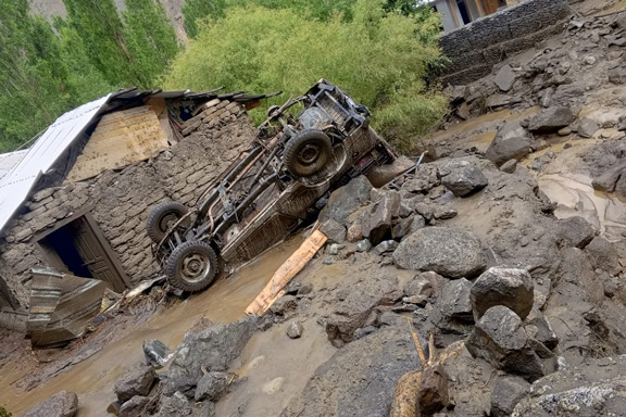 PESHAWAR A jeep lies overturned among massive boulders carried by a glacial lake outburst flood in Upper Chitral in July 2024. The flood damaged 44 houses and claimed dozens of livestock.