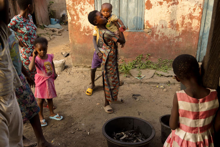 Street scene in the Onuegbu community, Bayelsa State. Ogbia, Nigeria. December 19, 2024. Credit: Jérôme Sessini