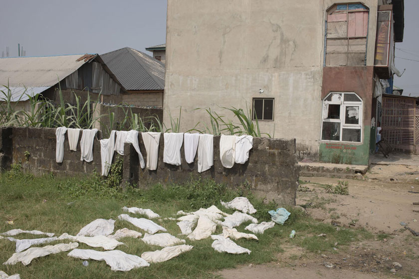 Street scene in the Onuegbu community, Bayelsa State. Nigeria. December 18, 2024. Credit: Jérôme Sessini