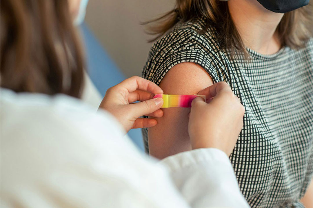 Health worker applies a plaster to a patient. Credit: LinkedIn