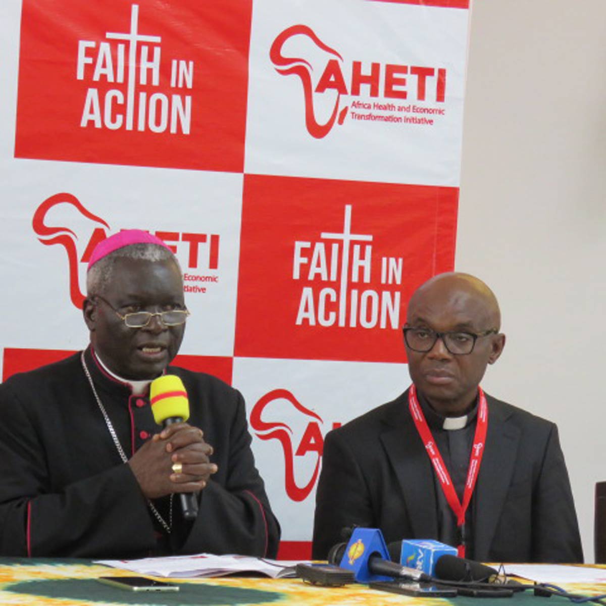 Archbishop Philip Anyolo of the Archdiocese of Nairobi (left) and Father Charles Chilufya (right) at a religious leaders' medical conference in Nairobi. Credit: Kenyaline Omolo