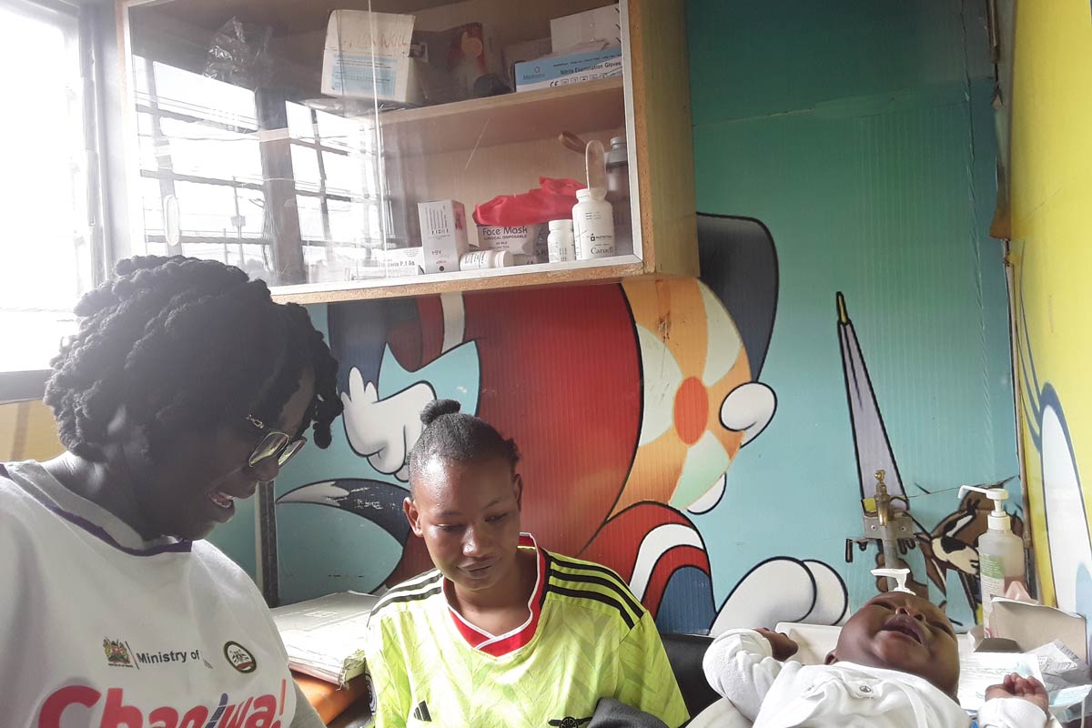 Baby Jaisley and her mother, Elizabeth Khayumbi, during a growth monitoring assessment. Thus far, she has not missed a single dose of the routine child vaccines. Credit: Joyce Chimbi