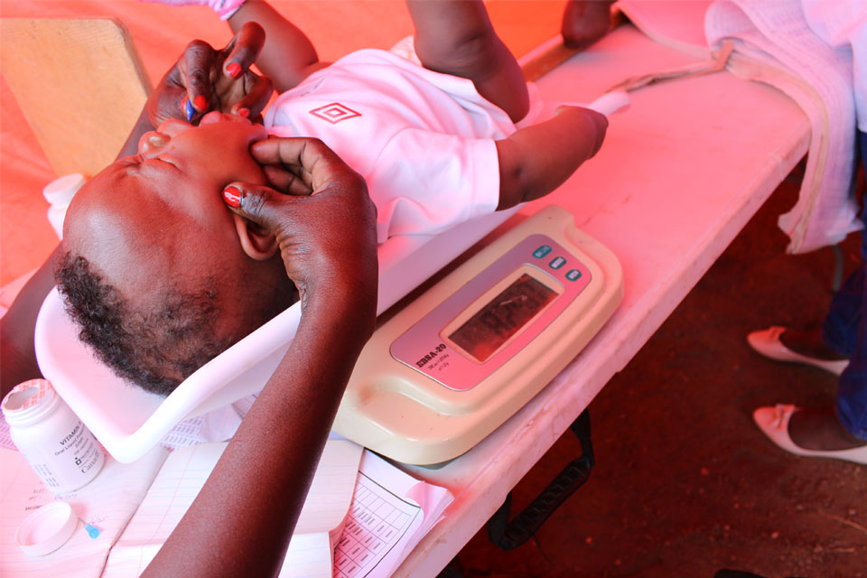 A child receiving polio vaccine during Entepesi Kenya's medical camp in June. Credit: Susan Methamo