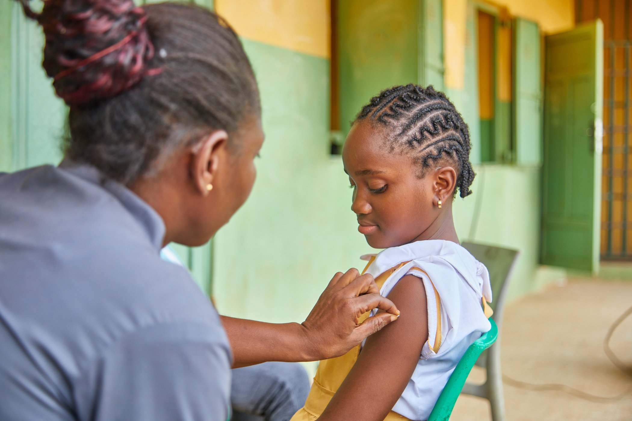 A medical official administers the Human Papillomavirus Vaccine (HPV) during a vaccine campaign in Nigeria in October 2023