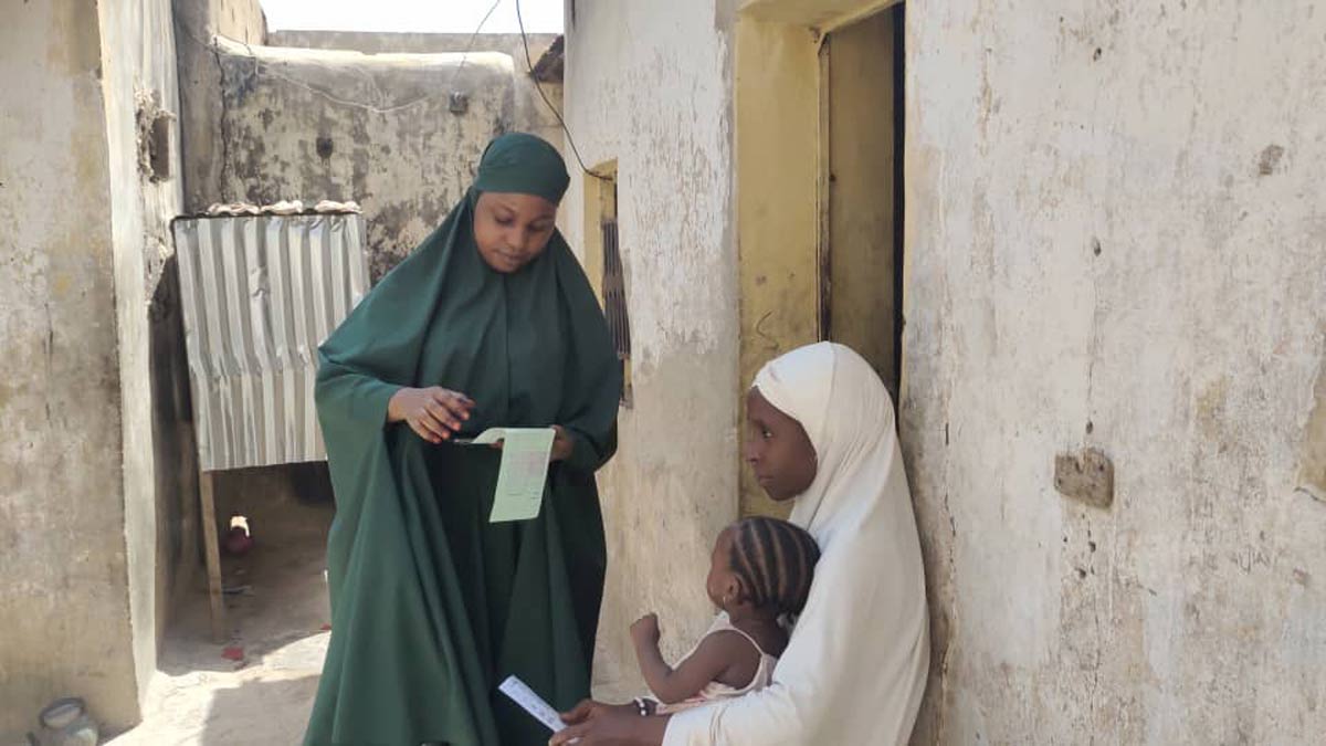 Aisha Tukur Gambo during a visit to household in Unguwar Alkali. Credit: Afeez Bolaji