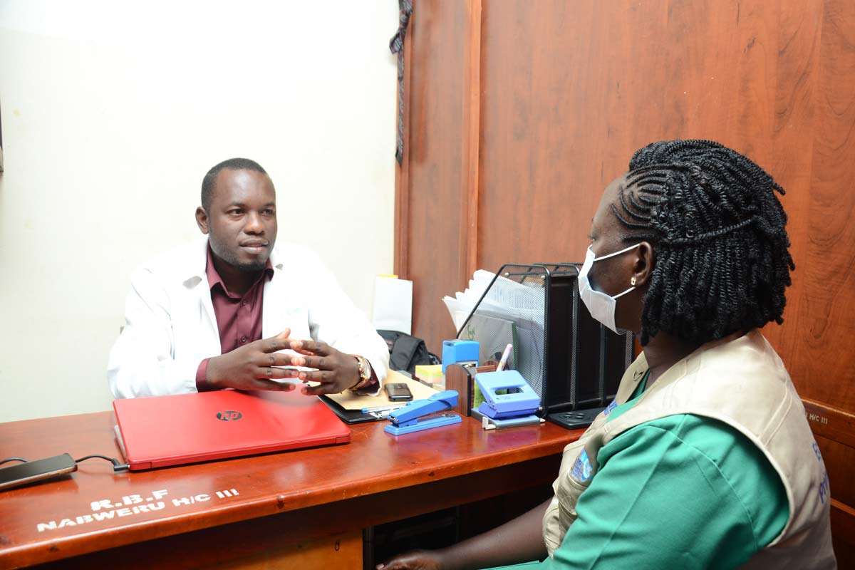 Nicholas Bamulasa, the incharge at Nabweru Health III, and Edith Nalwanga, a nurse and public health surveillance specialist.