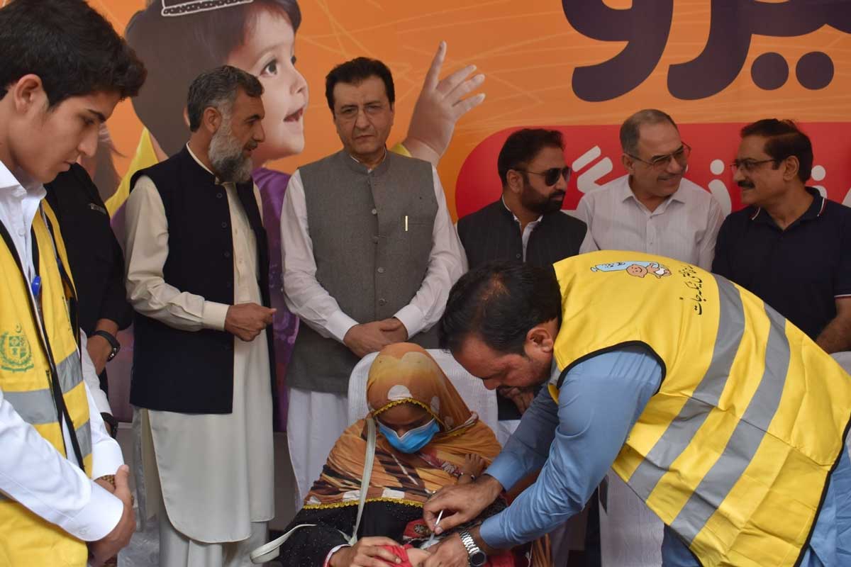 Officials from the Khyber Pakhtunkhwa Health Department overseeing vaccine administration during the launch of the third phase of the 'Big Catch-Up' campaign in July 2025.