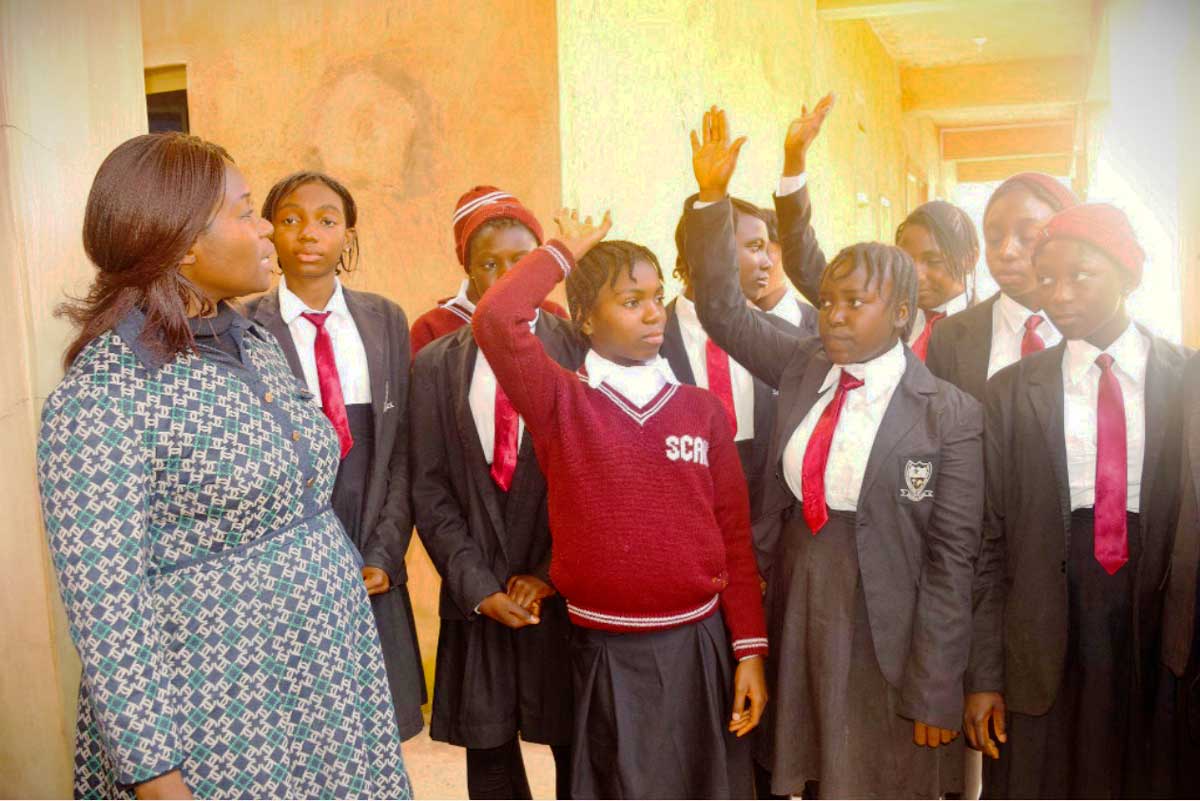 School principal Afodia Yusuf (left) educating students on the importance of HPV vaccination. Credit: Richard Adupong, JSI