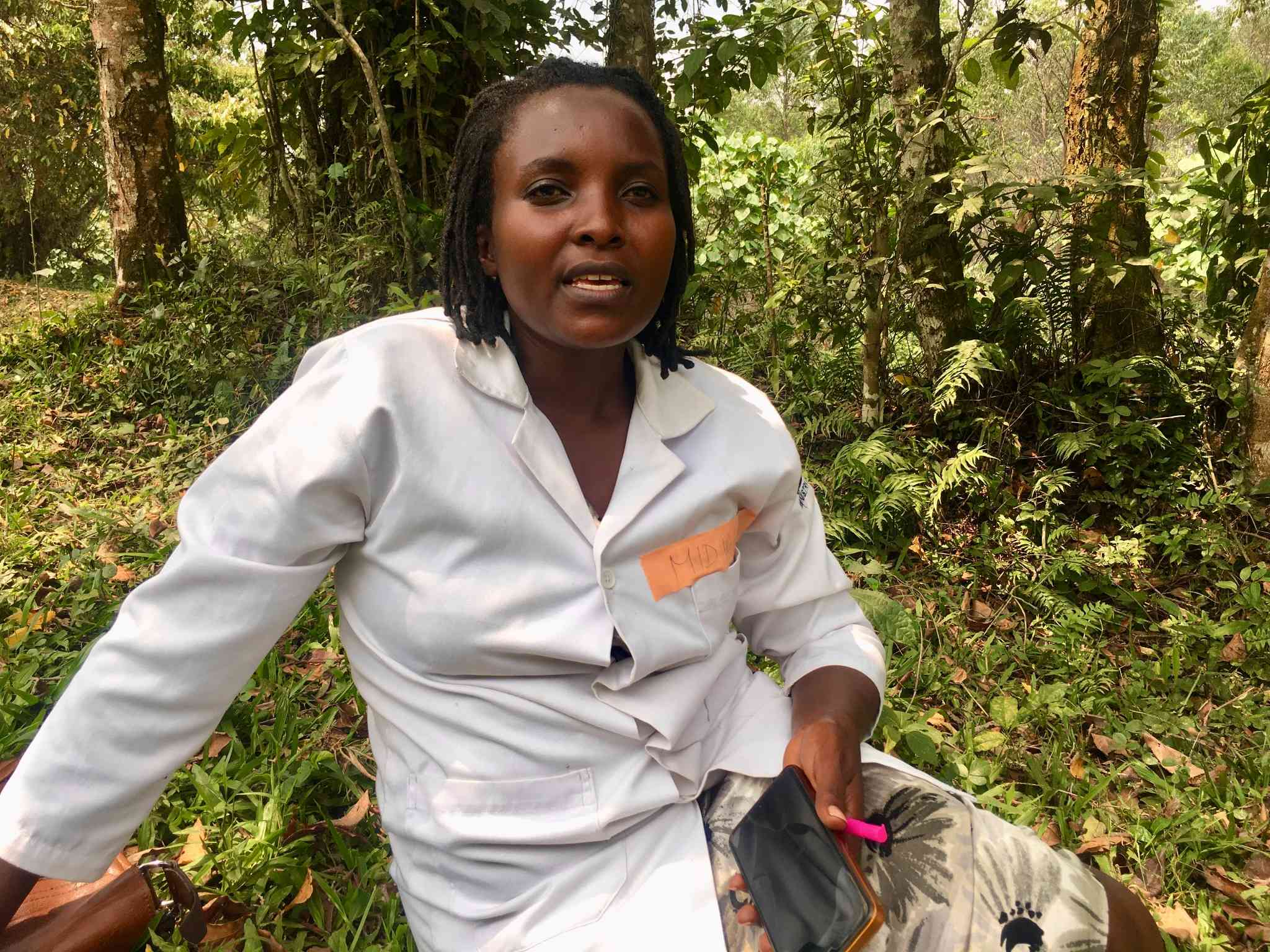 Sylvia Nyasuku. The midwife walks from tea plantation to tea plantation in Kanungu district searching for and vaccinating zero-dose children. Credit_John Agaba
