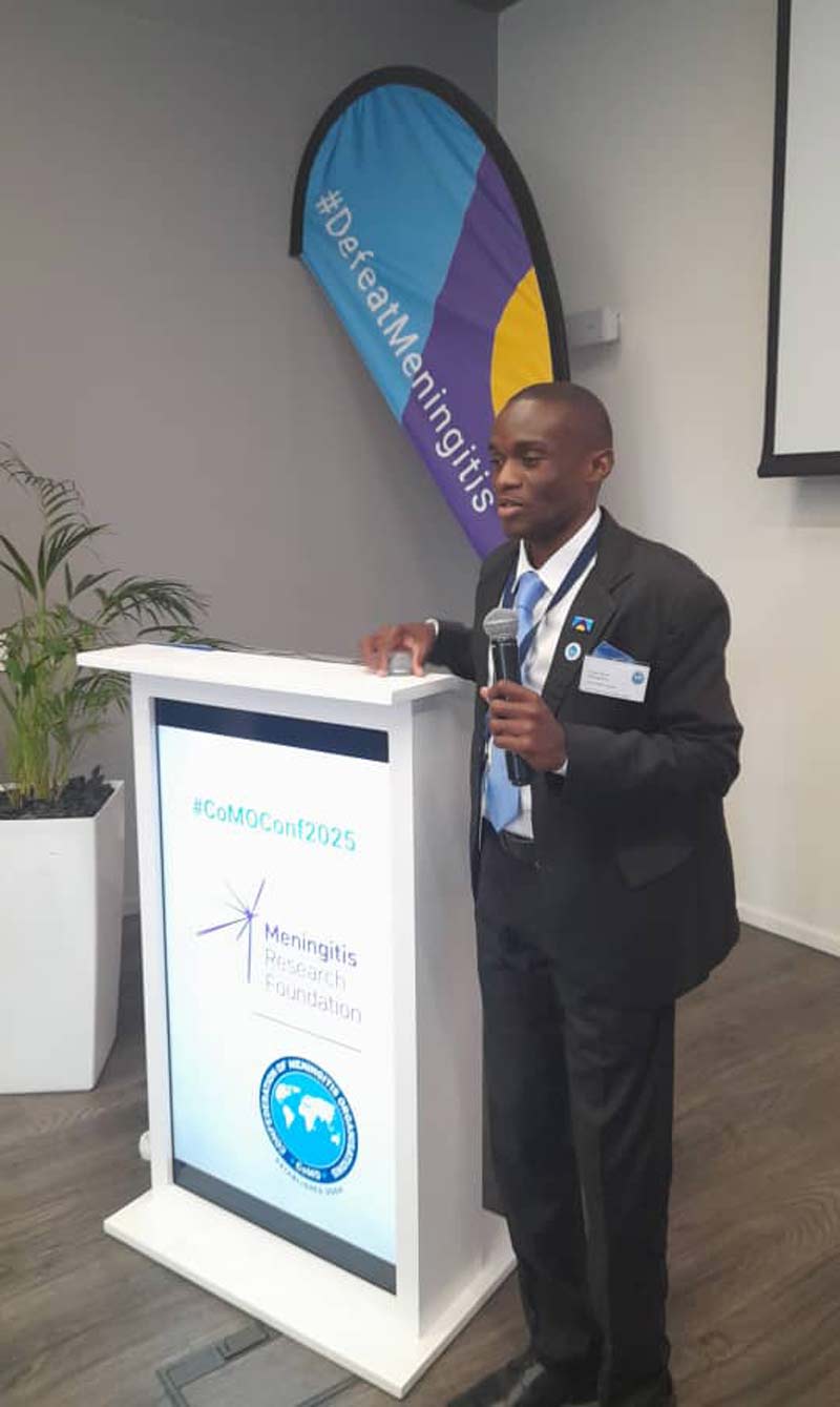 Tendai David Muranganwa speaking at the 2025 Confederation of Meningitis Organisations conference