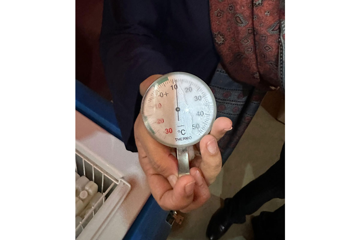 Hand holding a thermometer. Credit LinkedIn