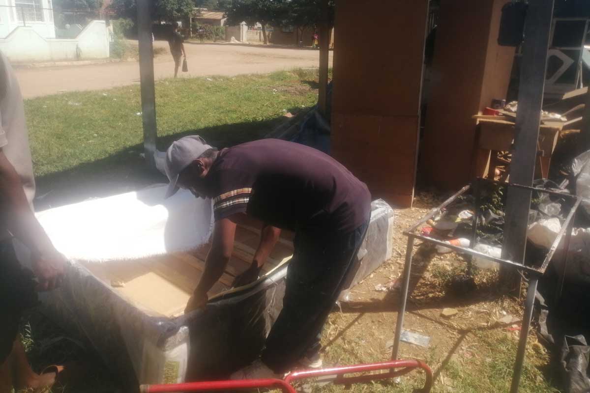 Wilbert Mavhunga, a carpenter whose workshop is just steps from the Budiriro Polyclinic