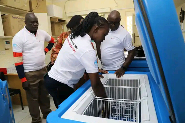 Health officials inspecting the vaccine fridge during the launch of the vaccine store at Suba west sub county vaccine store on Mfangano Island. Credit: Vaccines Kenya
