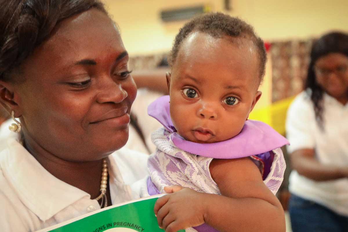 A mother and her child during the launch of the malaria pilot vaccine launched in Ghana in 2019. Credit: WHO/2019/Fanjan Combrink
